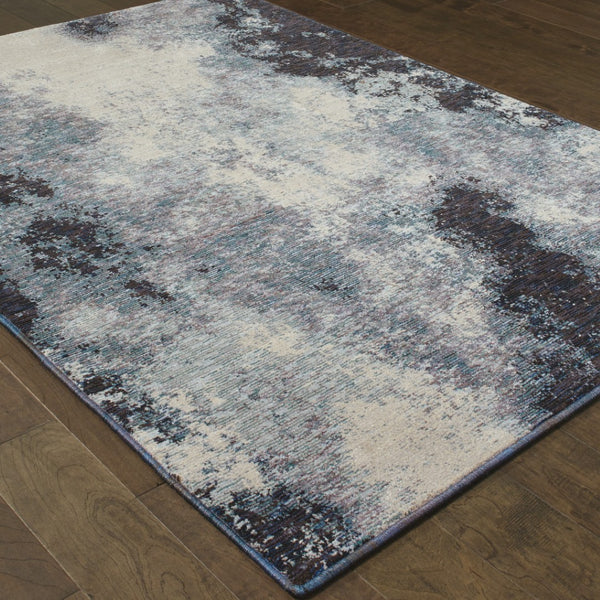 HomeRoots 10' Abstract Blue and Ivory Area Rug – Contemporary Power Loom Design for Modern Living Spaces 5' X 7' 510496