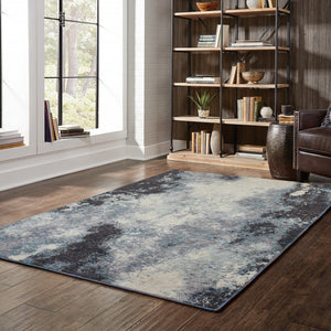 HomeRoots 10' Abstract Blue and Ivory Area Rug – Contemporary Power Loom Design for Modern Living Spaces 8' X 11' 510498