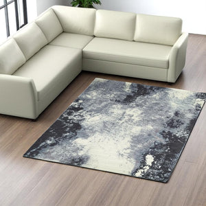 HomeRoots 10' Abstract Blue and Ivory Area Rug – Contemporary Power Loom Design for Modern Living Spaces 8' X 11' 510498