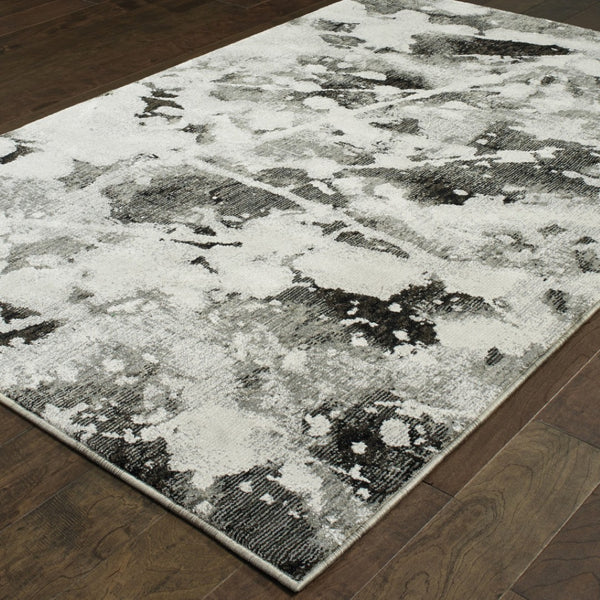 HomeRoots 10' Gray and White Abstract Power Loom Area Rug - Modern Comfort for Stylish Living Spaces 5' X 7' Rectangle 510560