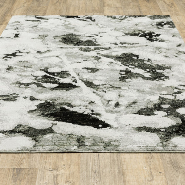 HomeRoots 10' Gray and White Abstract Power Loom Area Rug - Modern Comfort for Stylish Living Spaces 5' X 7' Rectangle 510560