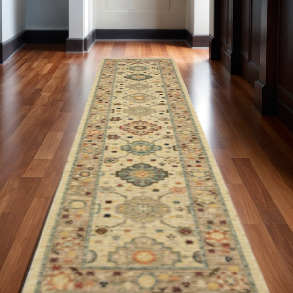 HomeRoots 2' Elegant Beige and Pale Blue Oriental Runner Rug - Stain Resistant, Fringed, Ideal for High Traffic Areas 2'6" x 12' 510600