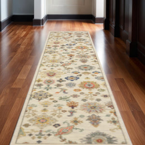HomeRoots 2' Elegant Oriental Runner Rug with Vibrant Colors, Stain Resistance, and Classic Fringe Tassels Ivory/ Multi 2'6" x 12' 510619