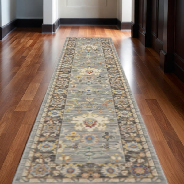 HomeRoots 6' Elegant Oriental Runner Rug in Blue, Ivory, and Red with Fringed Tassels for Hallways Blue/ Multi 2'6" x 12' 510622