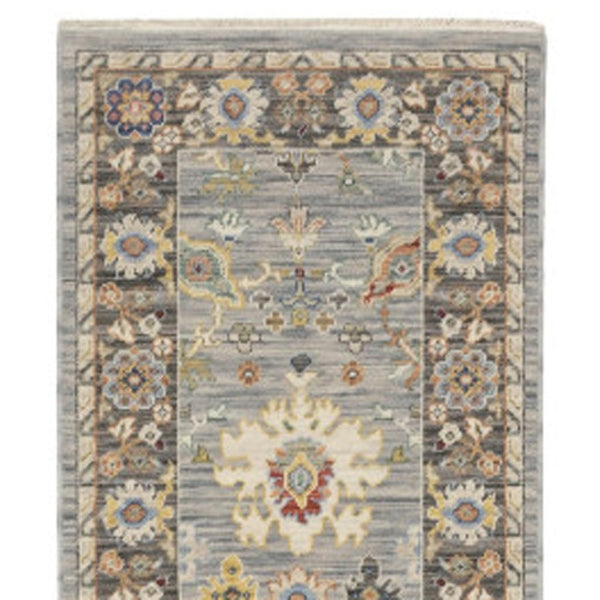HomeRoots 6' Elegant Oriental Runner Rug in Blue, Ivory, and Red with Fringed Tassels for Hallways Blue/ Multi 2'6" x 12' 510622