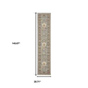 HomeRoots 6' Elegant Oriental Runner Rug in Blue, Ivory, and Red with Fringed Tassels for Hallways Blue/ Multi 2'6" x 12' 510622