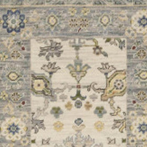 HomeRoots 6' Elegant Oriental Runner Rug in Blue, Ivory, and Red with Fringed Tassels for Hallways Ivory/ Blue 2'6" x 12' 510623