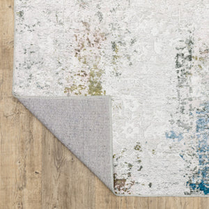 HomeRoots 4' Elegant Ivory and Blue Abstract Area Rug - Stain-Resistant, Non-Skid for Modern Living Spaces 4' X 6' 510647