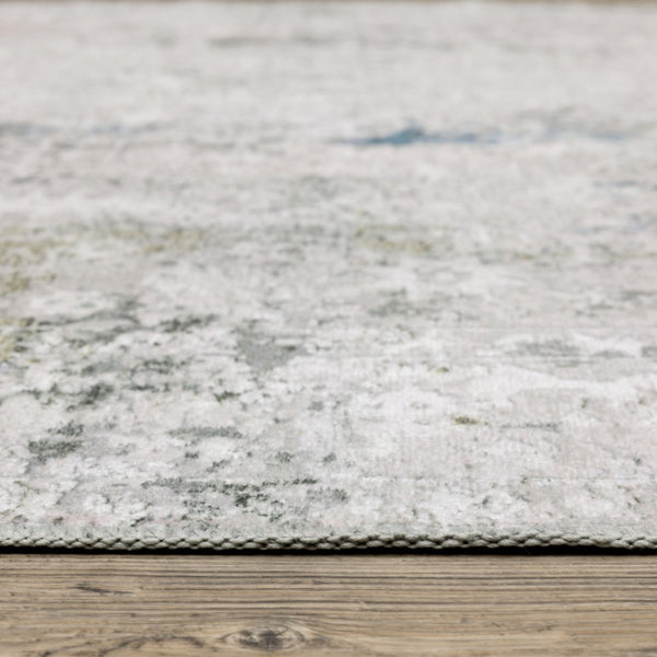 HomeRoots 4' Elegant Ivory and Blue Abstract Area Rug - Stain-Resistant, Non-Skid for Modern Living Spaces 5' X 7' 510648