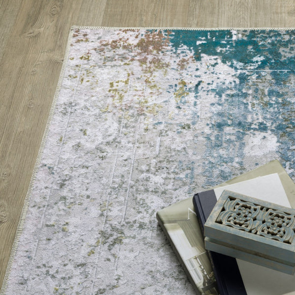 HomeRoots 4' Elegant Ivory and Blue Abstract Area Rug - Stain-Resistant, Non-Skid for Modern Living Spaces 5' X 7' 510648