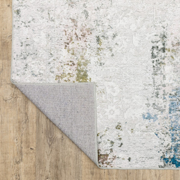 HomeRoots 4' Elegant Ivory and Blue Abstract Area Rug - Stain-Resistant, Non-Skid for Modern Living Spaces 5' X 7' 510648