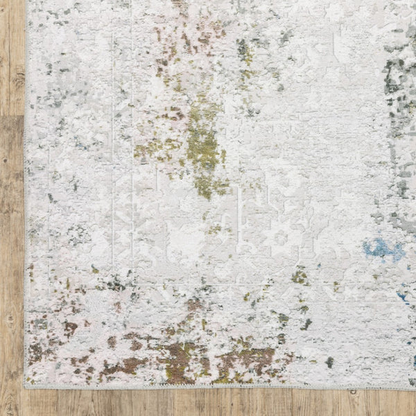 HomeRoots 4' Elegant Ivory and Blue Abstract Area Rug - Stain-Resistant, Non-Skid for Modern Living Spaces 5' X 7' 510648