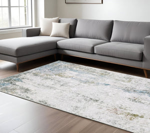 HomeRoots 4' Elegant Ivory and Blue Abstract Area Rug - Stain-Resistant, Non-Skid for Modern Living Spaces 8' X 10' 510649
