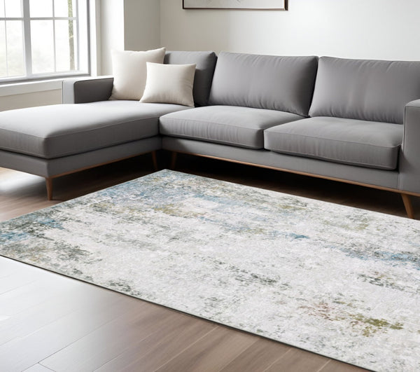 HomeRoots 4' Elegant Ivory and Blue Abstract Area Rug - Stain-Resistant, Non-Skid for Modern Living Spaces 8' X 10' 510649