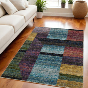 HomeRoots 10' Bold Purple and Red Geometric Power Loom Area Rug – Stain-Resistant, Ideal for High-Traffic Spaces 5' X 7' 510813
