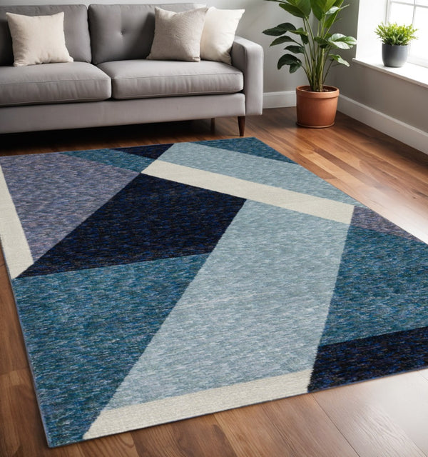 HomeRoots 10' Striking Geometric Area Rug in Vibrant Colors, Durable Power-Loomed Design for Modern Spaces 5' X 7' 510841