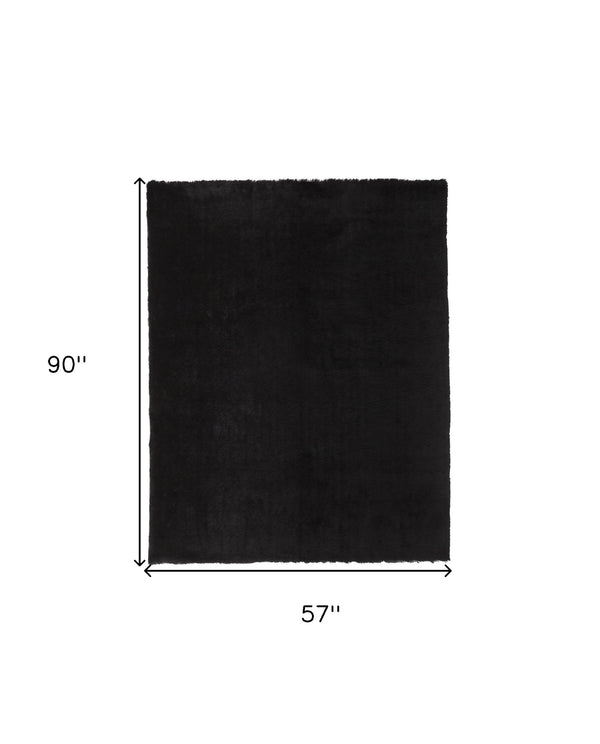 Homeroots 5' X 8' Black Shag Tufted Handmade Area Rug Black Polyester 510949