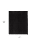 Homeroots 5' X 8' Black Shag Tufted Handmade Area Rug Black Polyester 510949