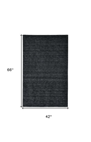 Homeroots 4' Black Wool Hand Woven Area Rug - Stain Resistant, Unique Artisan Craftsmanship For Modern Spaces 4' X 6' Wool 511042