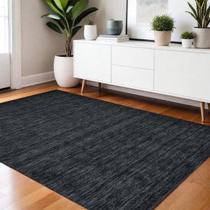 Homeroots 4' Black Wool Hand Woven Area Rug - Stain Resistant, Unique Artisan Craftsmanship For Modern Spaces 4' X 6' Wool 511042