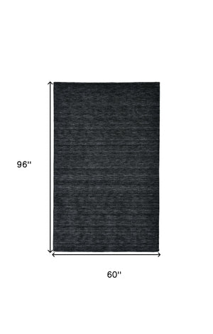 Homeroots 5' X 8' Black Wool Hand Woven Area Rug Black Wool 511043