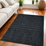 Homeroots 5' X 8' Black Wool Hand Woven Area Rug Black Wool 511043