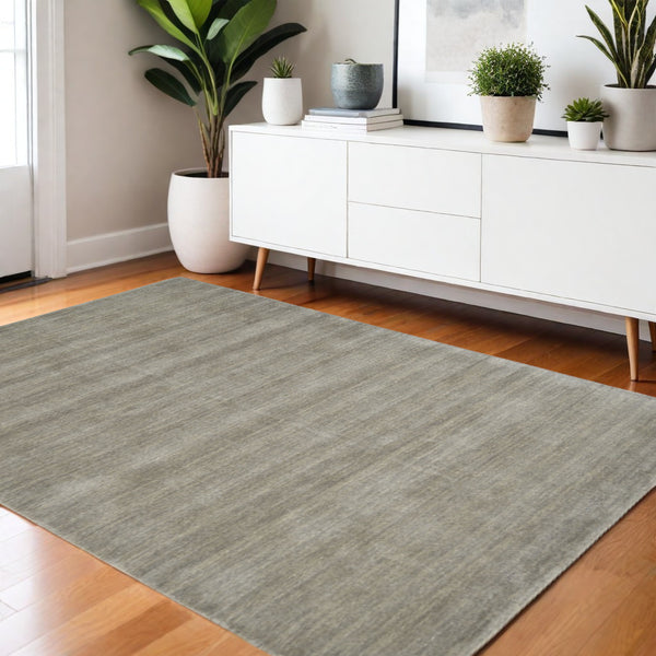 Homeroots 4' Black Wool Hand Woven Area Rug - Stain Resistant, Unique Artisan Craftsmanship For Modern Spaces 4' X 6' Wool 511058