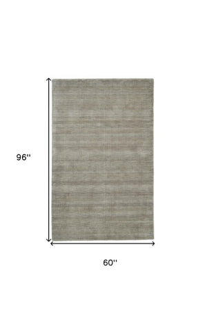 Homeroots 4' Black Wool Hand Woven Area Rug - Stain Resistant, Unique Artisan Craftsmanship For Modern Spaces 5' X 8' Wool 511059