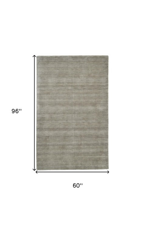 Homeroots 4' Black Wool Hand Woven Area Rug - Stain Resistant, Unique Artisan Craftsmanship For Modern Spaces 5' X 8' Wool 511059