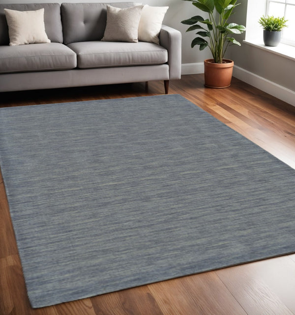 HomeRoots 4' Hand Woven Black Wool Area Rug - Timeless Elegance, Durable Comfort for Modern Living Spaces 5' X 8' 511083