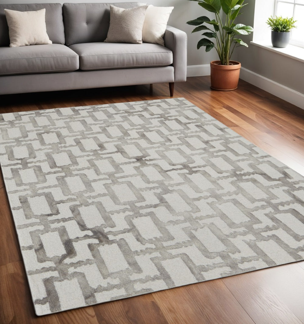 HomeRoots 4' Handmade Wool Area Rug with Geometric Ivory and Green Design – Perfect for Modern Spaces 5' X 8' 511105