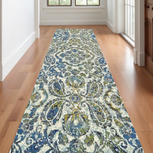 Homeroots 10' Ivory Blue And Green Floral Stain Resistant Runner Rug  Polypropylene 511148