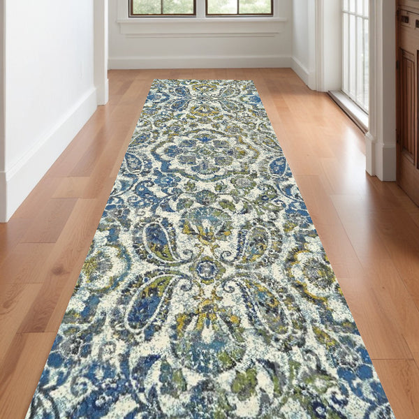 Homeroots 10' Ivory Blue And Green Floral Stain Resistant Runner Rug  Polypropylene 511148