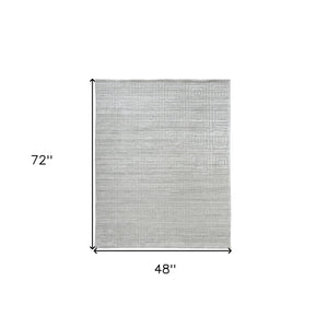 Homeroots 4' X 6' Ivory Geometric Hand Woven Area Rug Ivory Viscose 511187