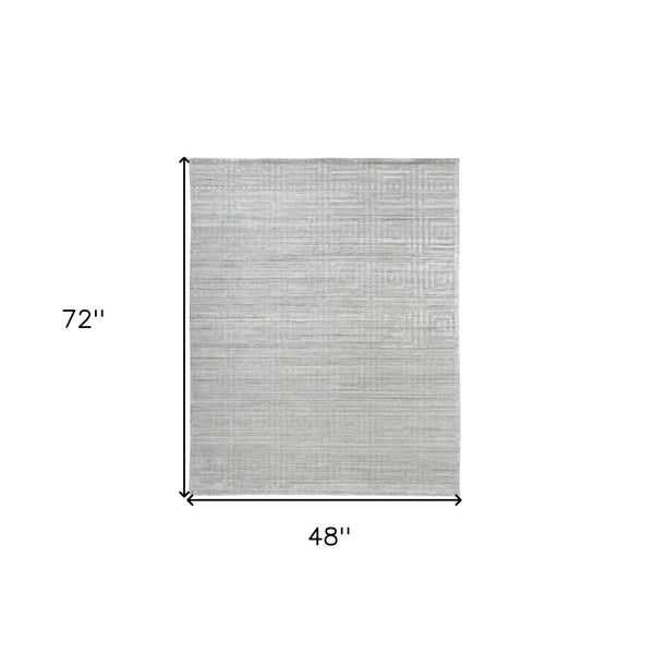 Homeroots 4' X 6' Ivory Geometric Hand Woven Area Rug Ivory Viscose 511187