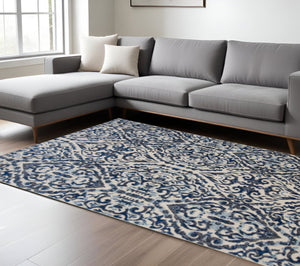HomeRoots 10' Blue Ivory and Black Floral Distressed Area Rug - Stain Resistant, Perfect for Busy Homes & Decor 10' X 14' 511215