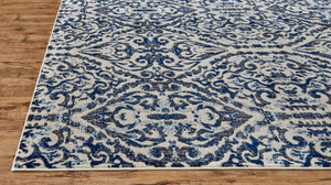 HomeRoots 10' Blue Ivory and Black Floral Distressed Area Rug - Stain Resistant, Perfect for Busy Homes & Decor 10' X 14' 511215