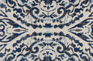 HomeRoots 10' Blue Ivory and Black Floral Distressed Area Rug - Stain Resistant, Perfect for Busy Homes & Decor 9' Round 511217