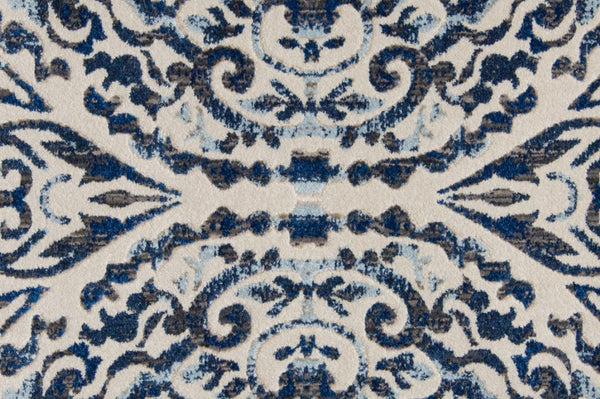 HomeRoots 10' Blue Ivory and Black Floral Distressed Area Rug - Stain Resistant, Perfect for Busy Homes & Decor 9' Round 511217