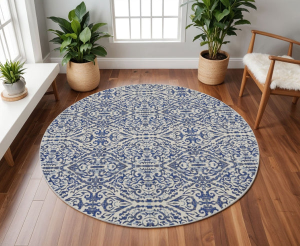 HomeRoots 10' Blue Ivory and Black Floral Distressed Area Rug - Stain Resistant, Perfect for Busy Homes & Decor 9' Round 511217