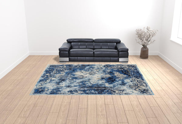 Homeroots 10' X 14' Blue Ivory And Gray Floral Distressed Stain Resistant Area Rug  Polypropylene 511246