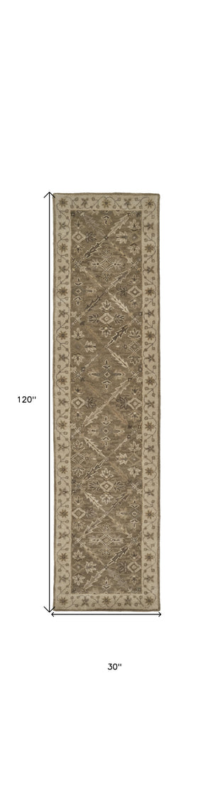 Homeroots 10' Green Brown And Taupe Wool Paisley Tufted Handmade Stain Resistant Runner Rug  Wool 511284