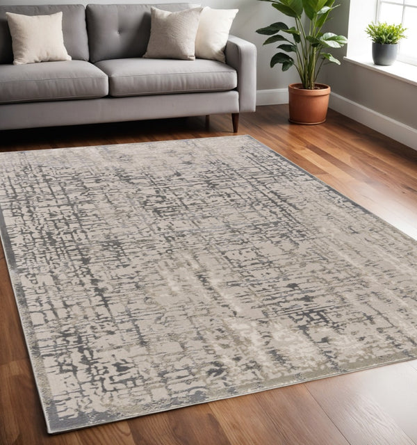 HomeRoots 5' Gray and Ivory Abstract Area Rug - Stain Resistant, Durable, Modern Design for Any Room 5' X 8' 511379