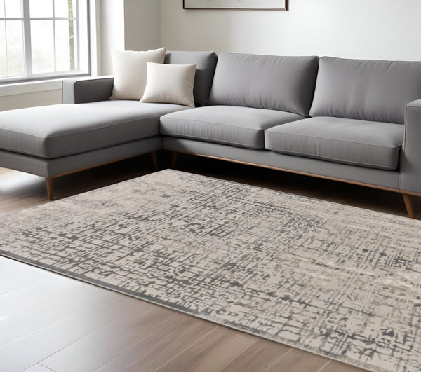 HomeRoots 5' Gray and Ivory Abstract Area Rug - Stain Resistant, Durable, Modern Design for Any Room 10' X 13' 511381
