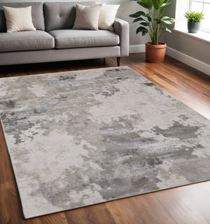 HomeRoots 5' Ivory and Gray Abstract Area Rug - Stain-Resistant, Durable, Modern Elegance for Any Room 5' X 8' 511387
