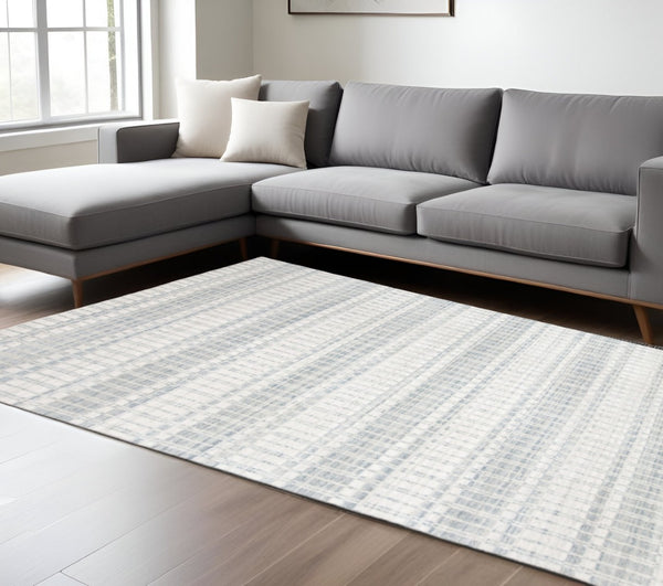 HomeRoots 7' Hand-Woven Ivory and Blue Striped Area Rug – Coastal Charm for Modern and Transitional Spaces 7' X 9' 511451
