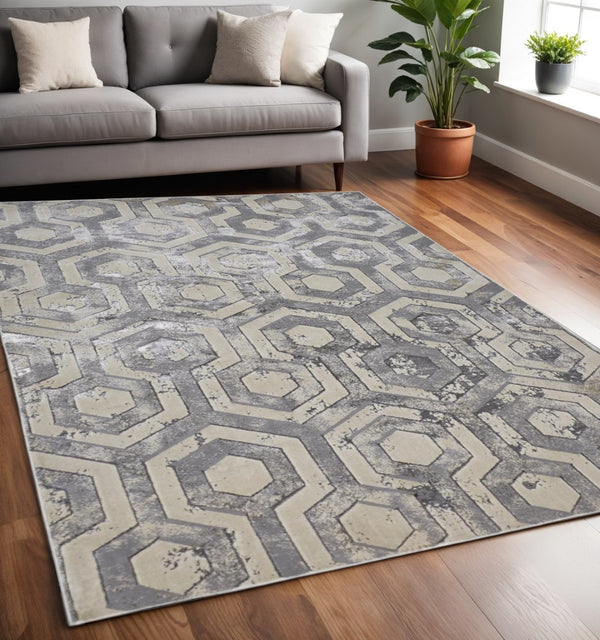 HomeRoots 4' Transform Your Space with a Gray Taupe and Silver Abstract Area Rug for Modern Elegance 5' X 8' 511484