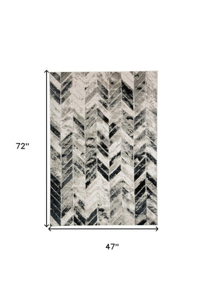HomeRoots 4' Gray and Black Chevron Area Rug - Modern, Durable Design for Living Rooms and Cozy Spaces 4' X 6' 511506