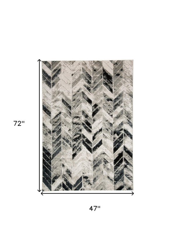 HomeRoots 4' Gray and Black Chevron Area Rug - Modern, Durable Design for Living Rooms and Cozy Spaces 4' X 6' 511506