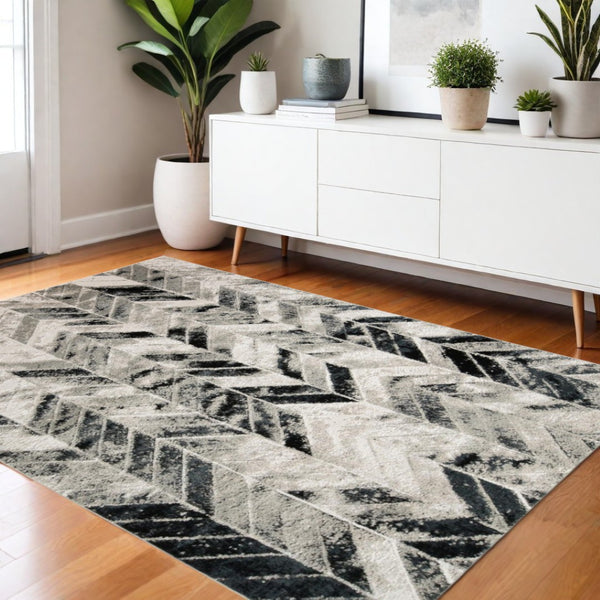 HomeRoots 4' Gray and Black Chevron Area Rug - Modern, Durable Design for Living Rooms and Cozy Spaces 4' X 6' 511506